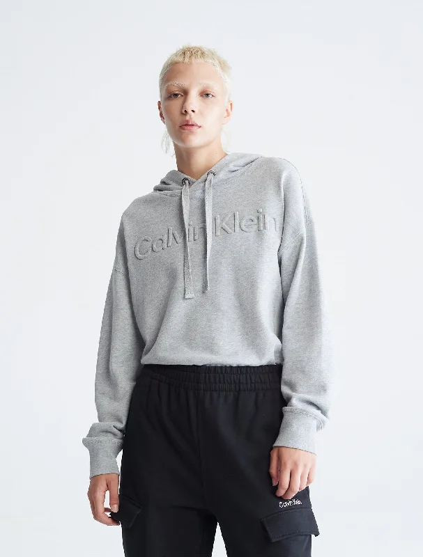 Calvin Klein Oversized Embossed Logo Hoodie - Women Hoodie with Half-Zip Sporty Casual